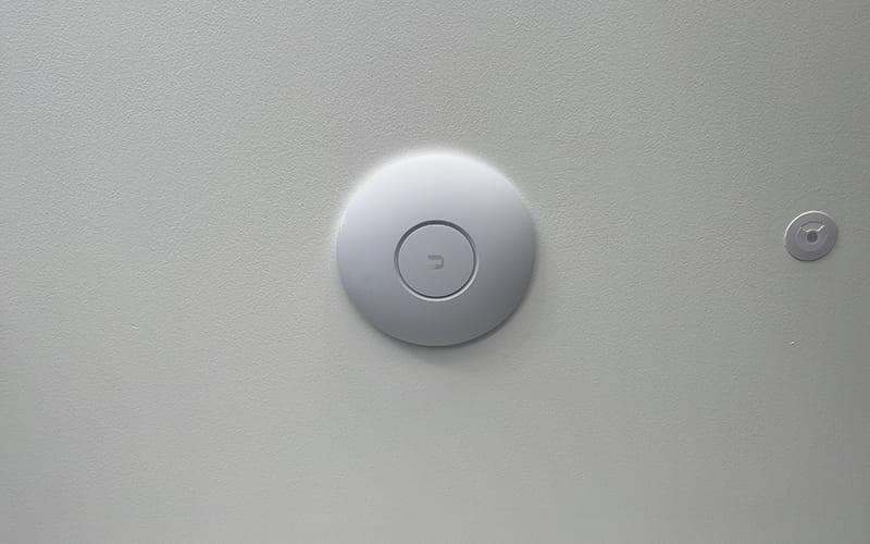 Wi-Fi access point flush-mounted on a ceiling